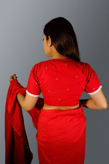 Red handwoven jamdani blouse with hakoba yoke and lace detailing